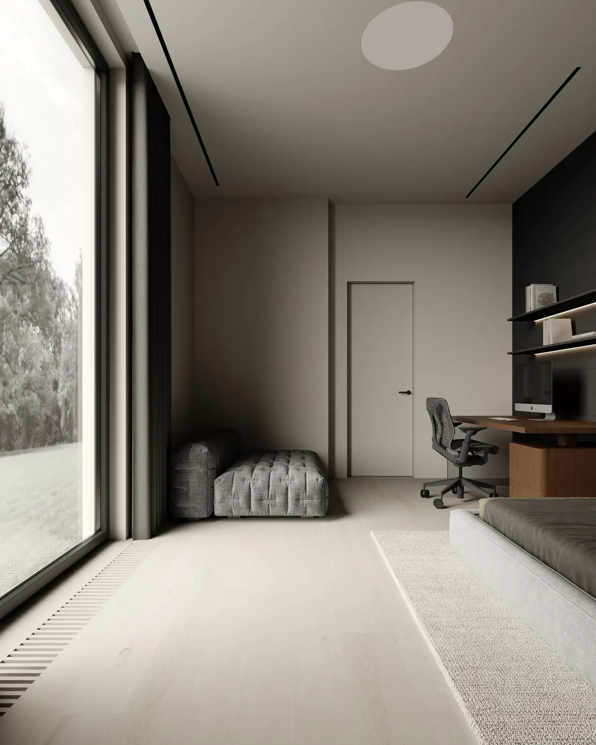 View from the window: sofa, hidden door, and workspace